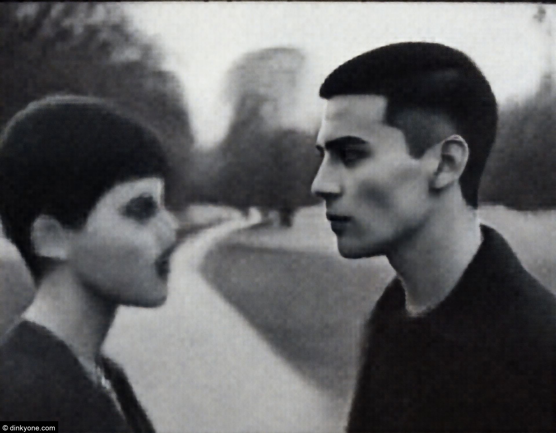 A couple in a country park with scenic walking paths.