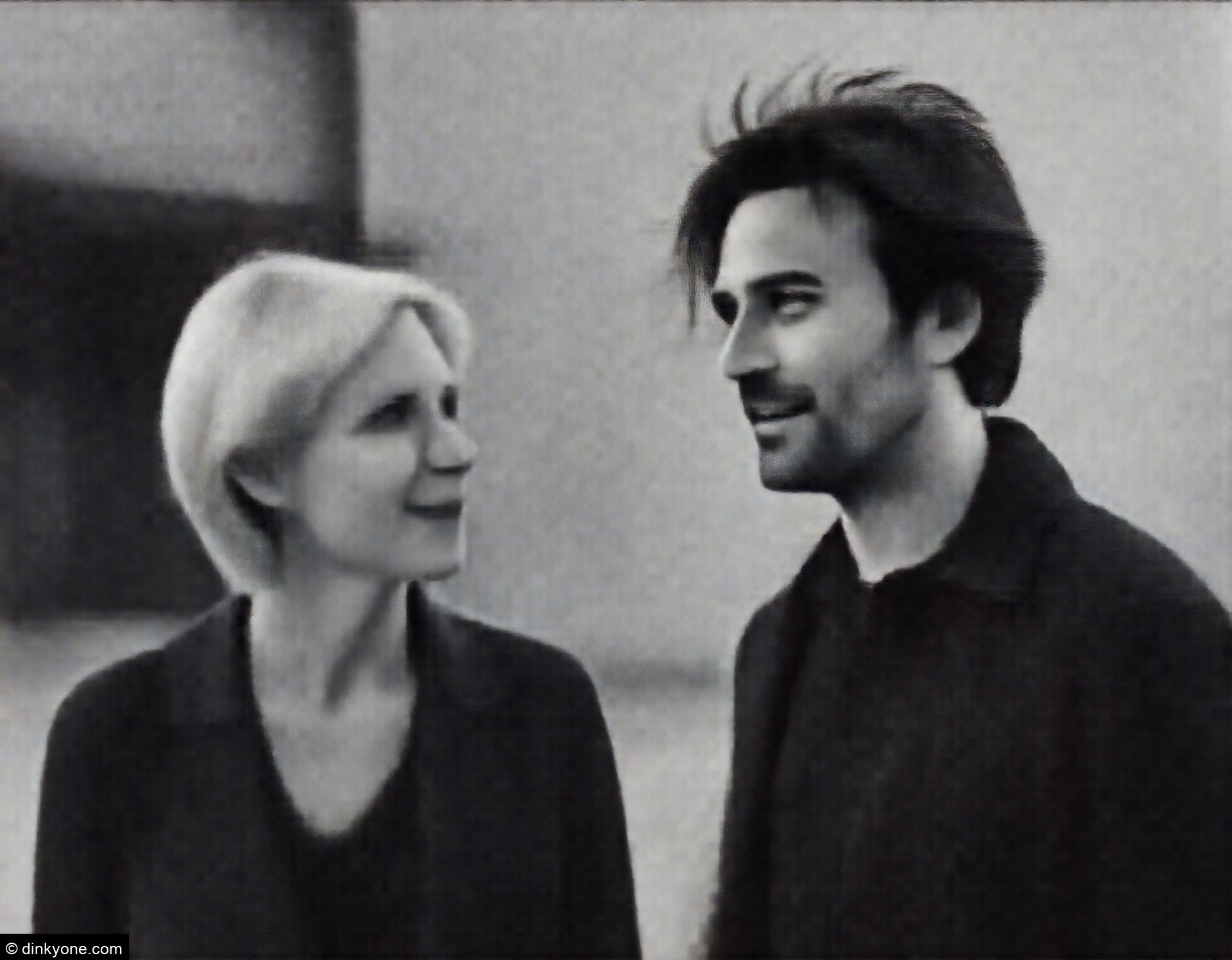 A couple outside a museum of modern art.